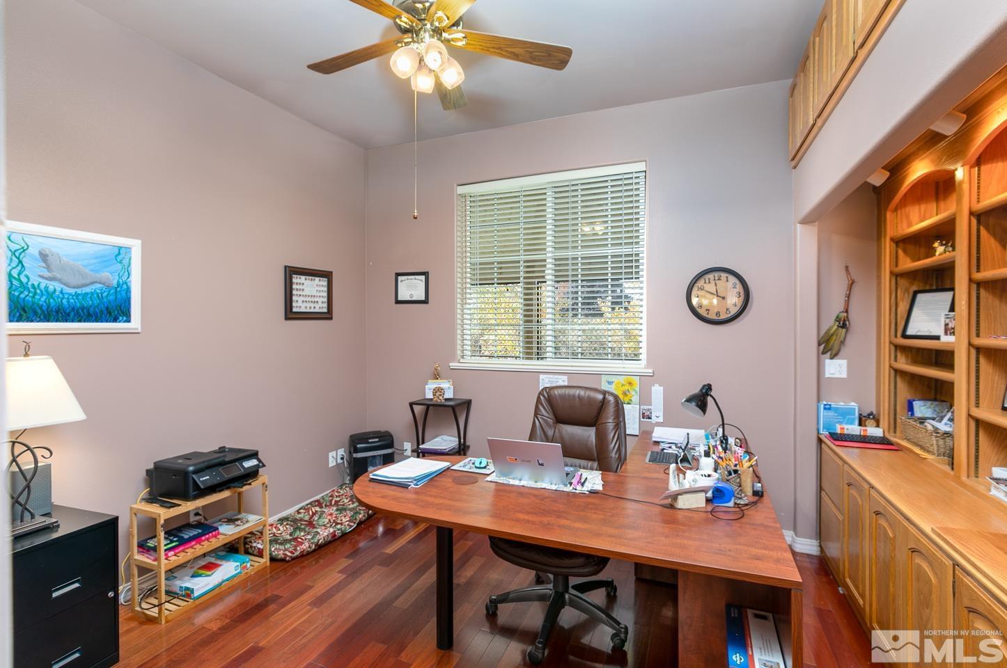 5275 Rivers Edge Drive Fallon, NV 89406 - Photo 10 of 36 a workspace with furniture and a window