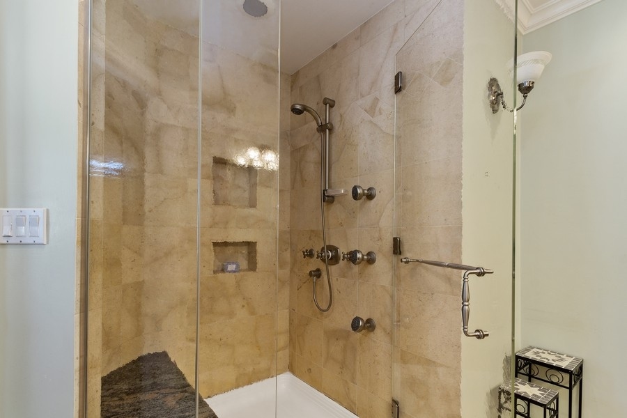 1164 Devonshire Road Buffalo Grove, IL 60089 - Photo 11 of 20 a bathroom with a shower