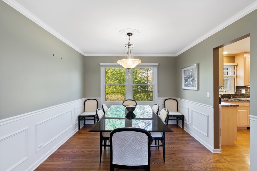 1164 Devonshire Road Buffalo Grove, IL 60089 - Photo 3 of 20 a dining room with furniture and window