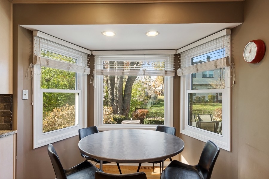 1164 Devonshire Road Buffalo Grove, IL 60089 - Photo 7 of 20 a living room with furniture and a window