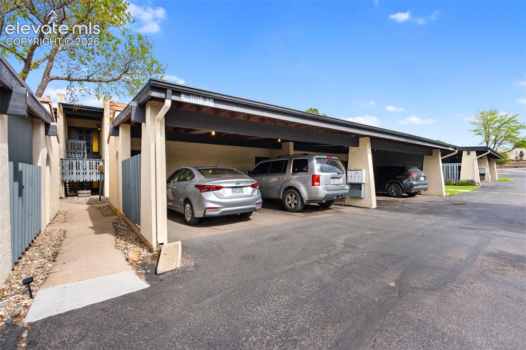 1018 Fontmore Road, Unit A Colorado Springs, CO 80904 - Photo 23 of 28 a view of a car parked in front of a building
