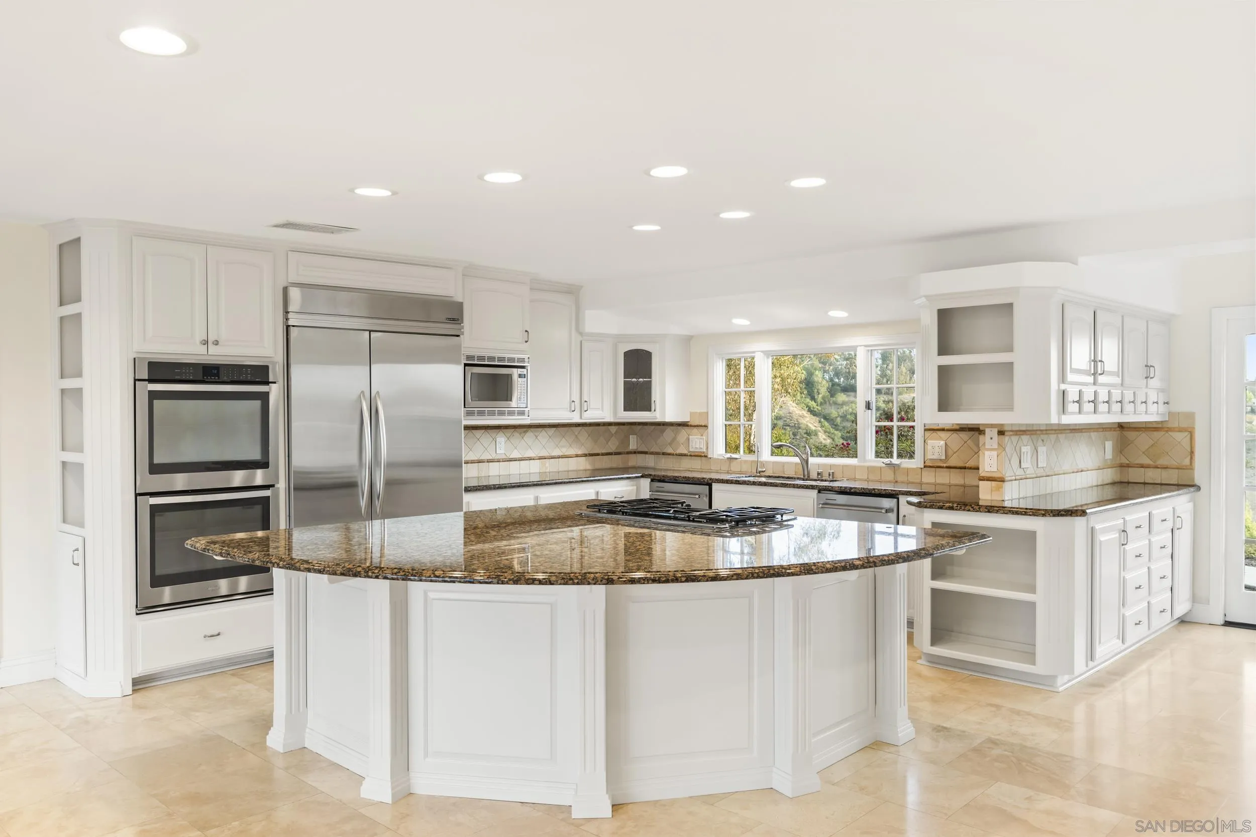 16551 Zumaque Street Rancho Santa Fe, CA 92067 - Photo 12 of 58 Newly painted cabinets, 2-dishwashers, large kithen island with wine cabinet