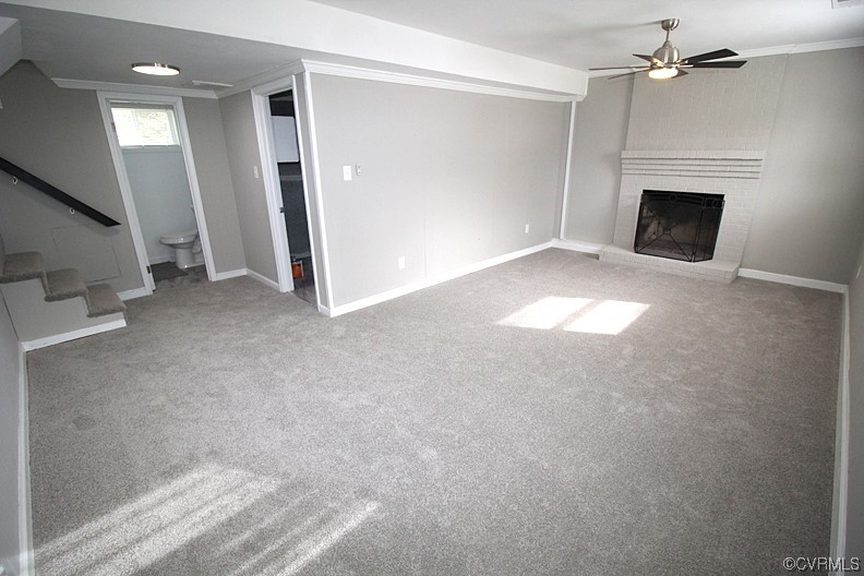 6440 Commander Road Richmond, VA 23224 - Photo 18 of 20 a view of empty room with fireplace