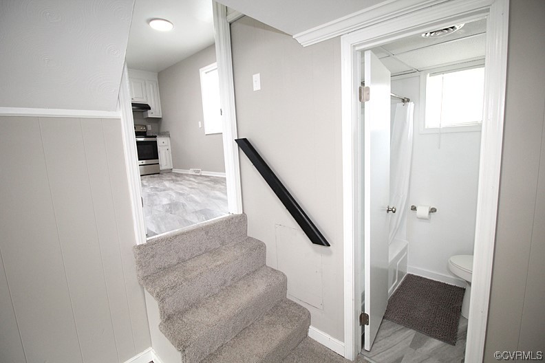6440 Commander Road Richmond, VA 23224 - Photo 19 of 20 a view of entryway and hall with wooden floor