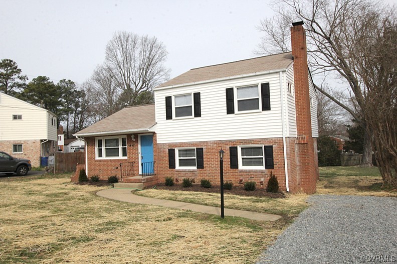 6440 Commander Road Richmond, VA 23224 - Photo 3 of 20 a view of a yard in front of a house