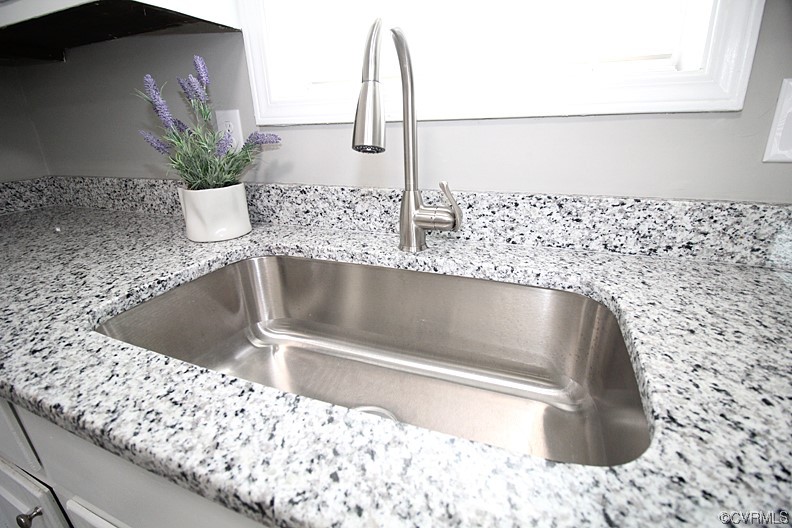 6440 Commander Road Richmond, VA 23224 - Photo 10 of 20 a close view of sink and tap