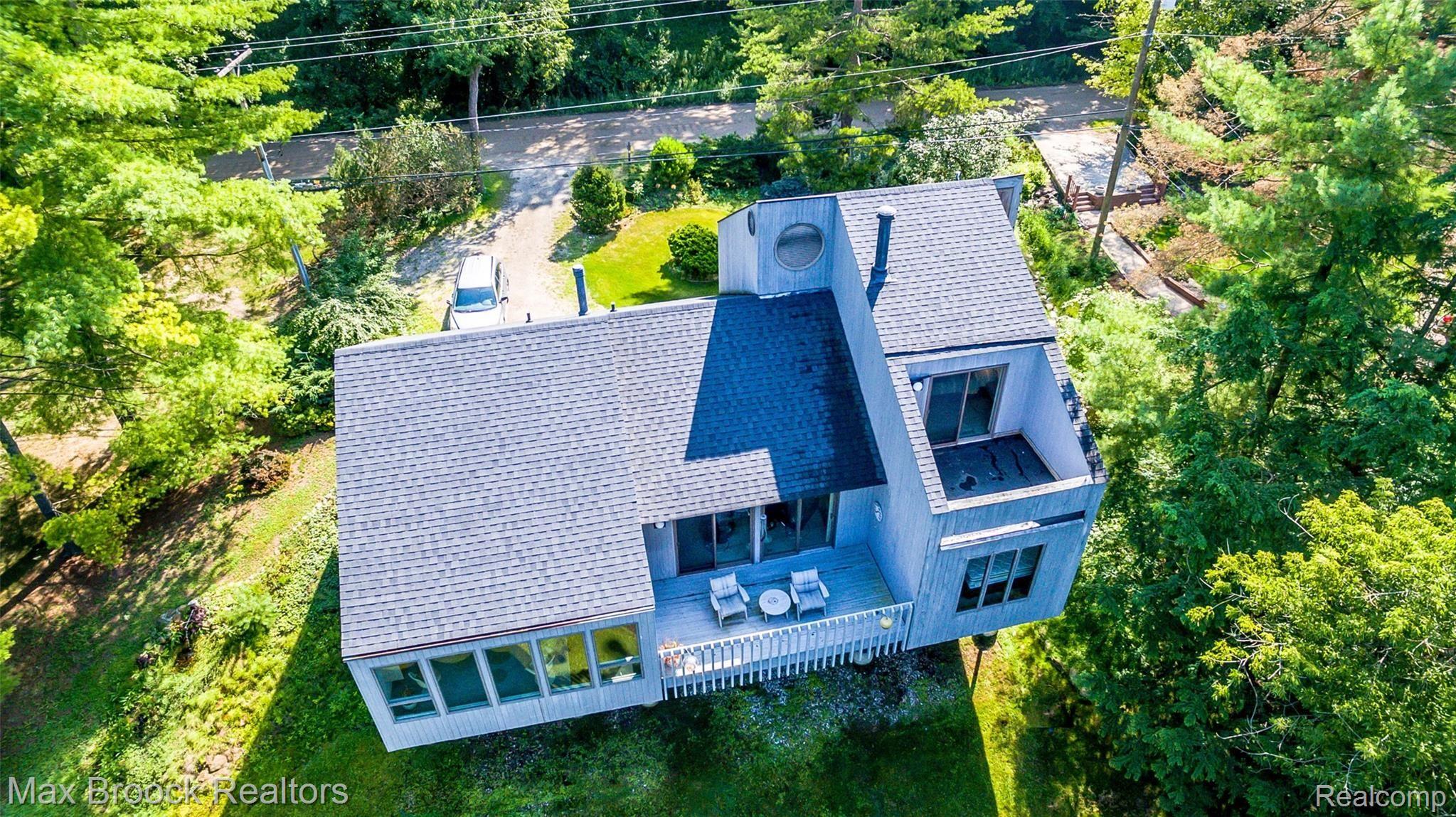 5724 North Livernois Road Rochester, MI 48306 - Photo 49 of 52 Arial view shows balcony and windows placed for maximum slight and views.