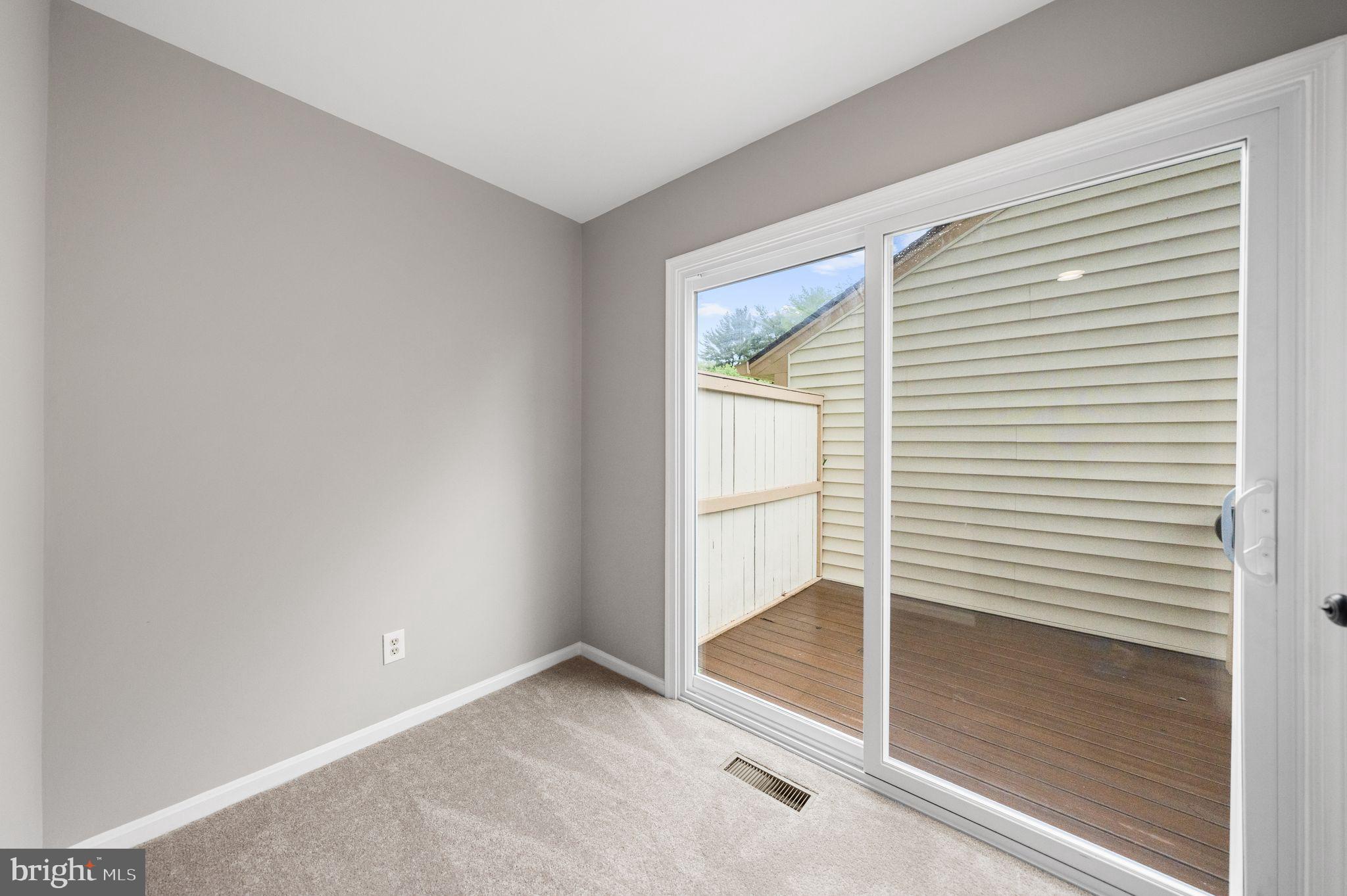 10028 Dellcastle Road Gaithersburg, MD 20886 - Photo 28 of 57 Sitting room w/access to deck off the primary bed