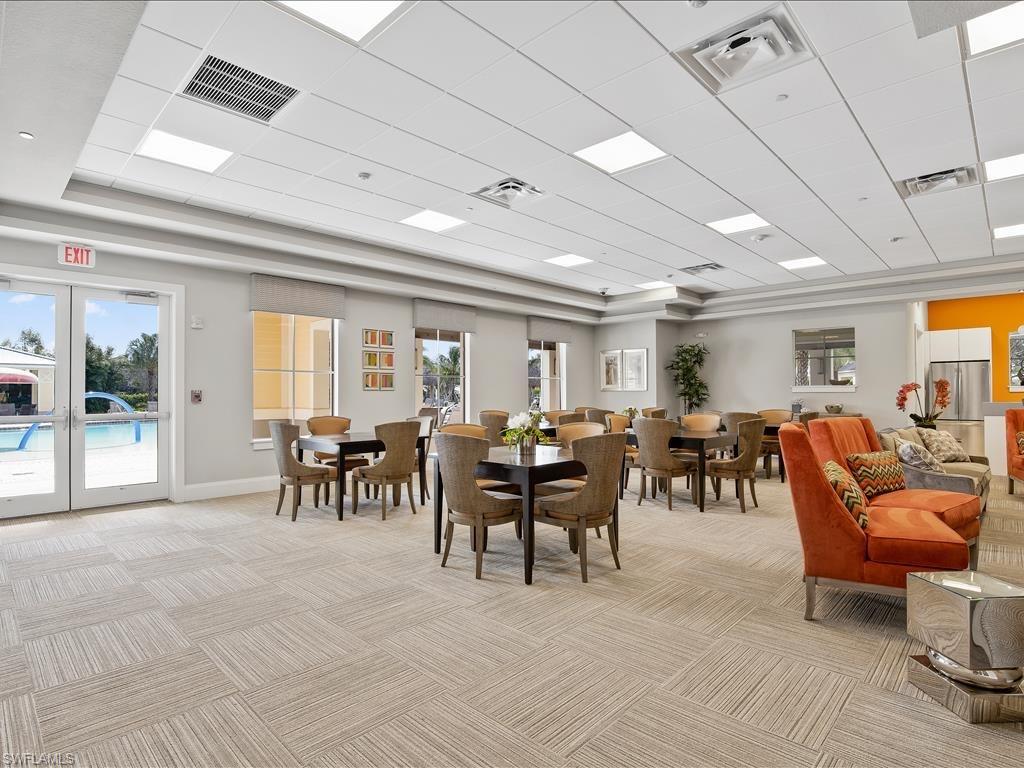 2320 Dragonfruit Way Naples, FL 34120 - Photo 33 of 33 Dining space with visible vents and light colored carpet