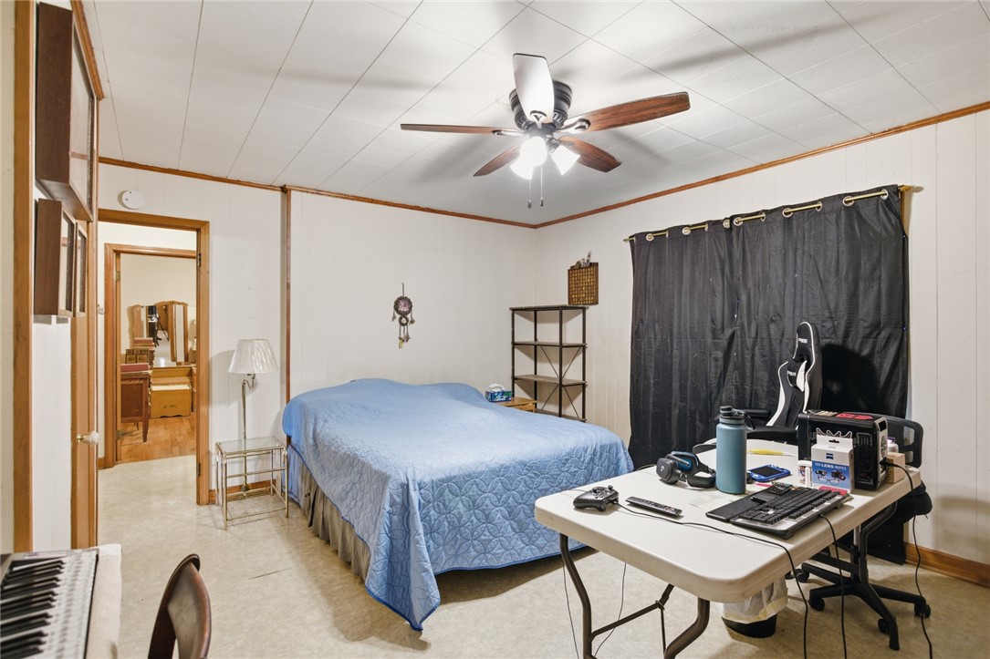 282 West Bennett Road Westminster, SC 29693 - Photo 18 of 42 This cozy bedroom features a ceiling fan, ensuring comfort and relaxation.