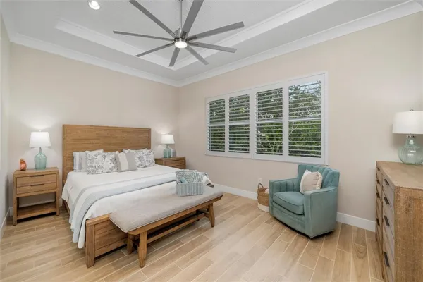 a bedroom with a bed and a couch