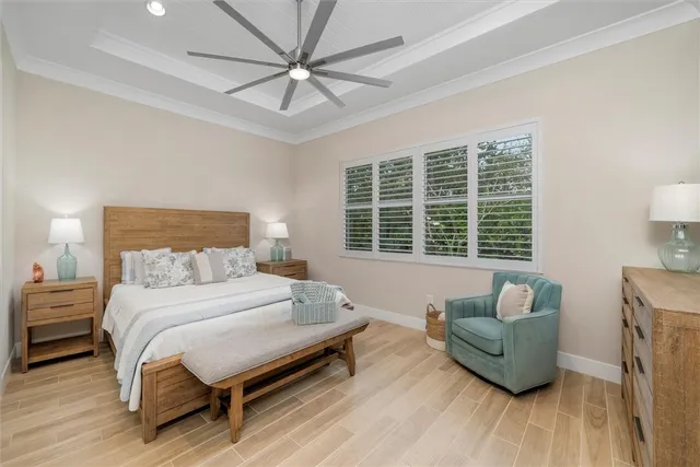 a bedroom with a bed and a couch