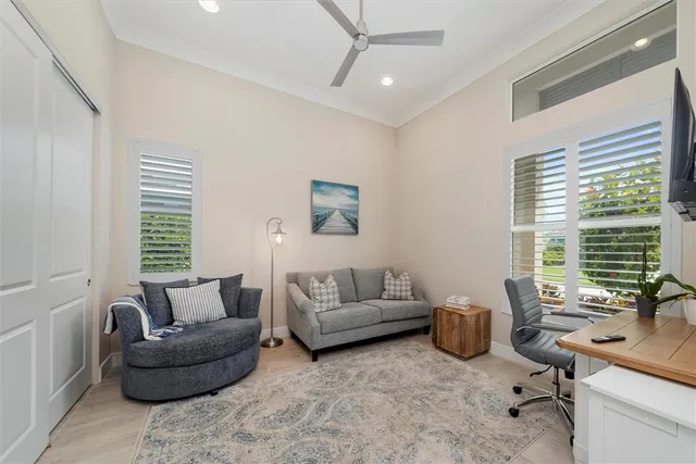 a living room with furniture and windows