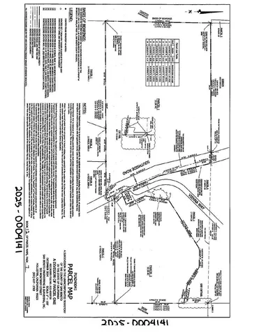 a black and white photo of a living room