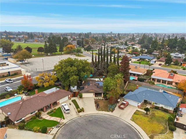 an aerial view of a city with lots of residential buildings