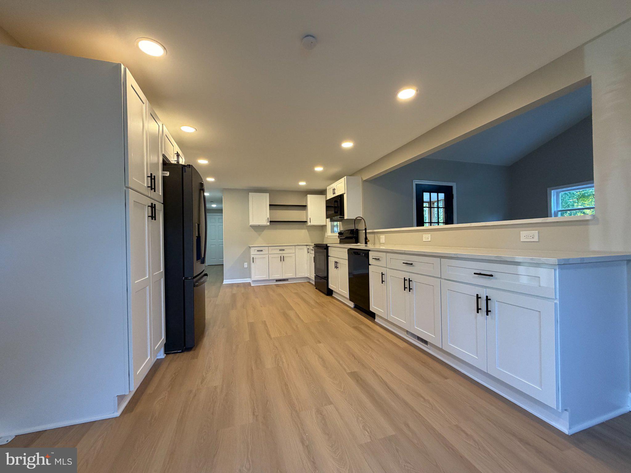 109 Birch Road Stevensville, MD 21666 - Photo 14 of 61 Modern kitchen with sleek finishes.