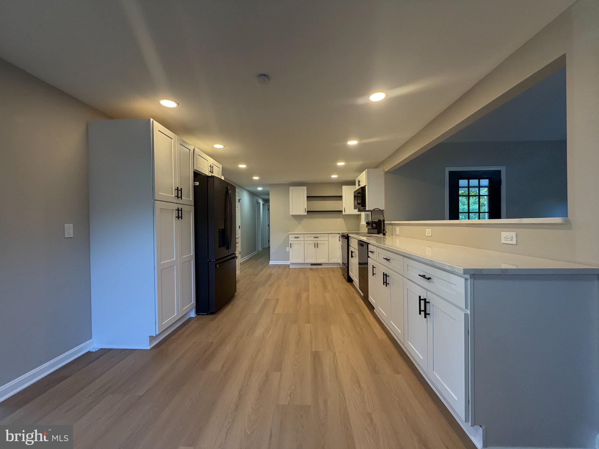 109 Birch Road Stevensville, MD 21666 - Photo 15 of 61 Modern kitchen with sleek finishes.