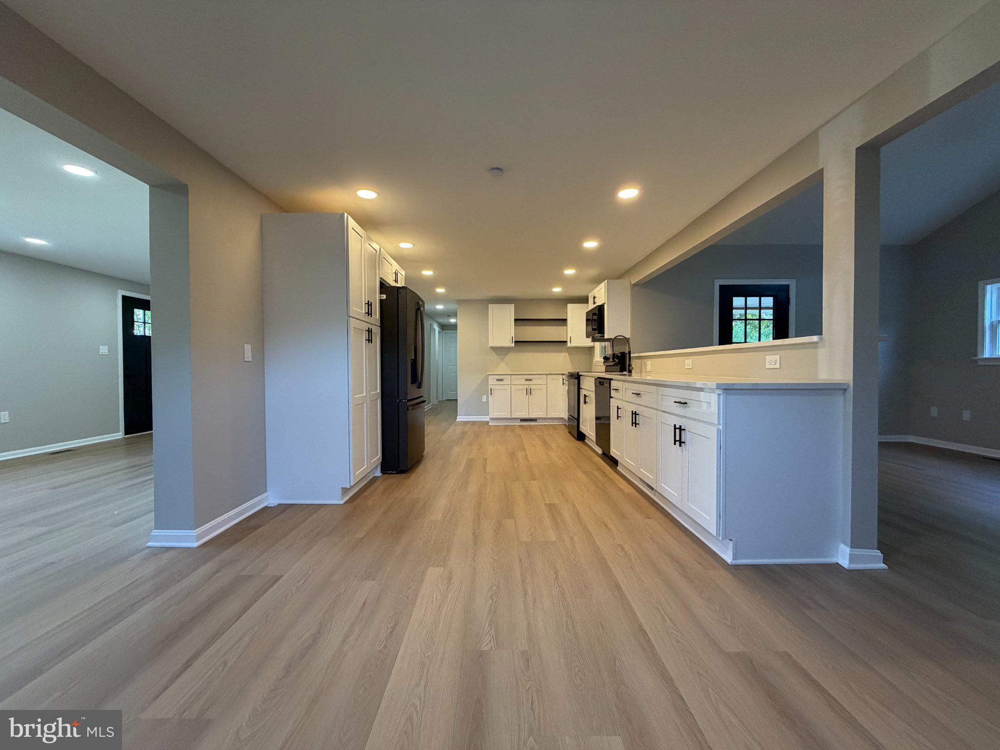 109 Birch Road Stevensville, MD 21666 - Photo 17 of 61 Spacious modern kitchen with light tones.