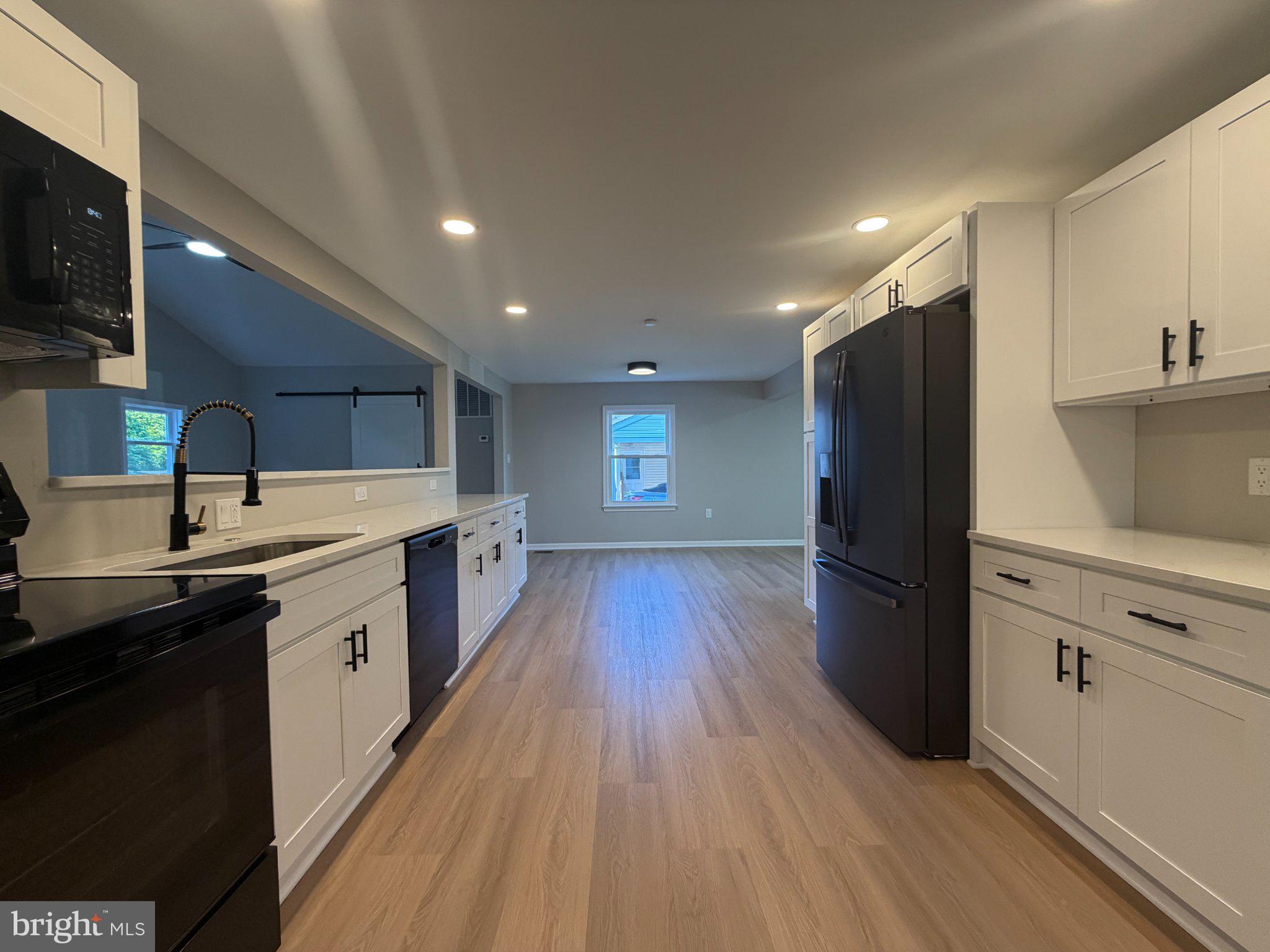 109 Birch Road Stevensville, MD 21666 - Photo 18 of 61 Modern kitchen with sleek finishes.