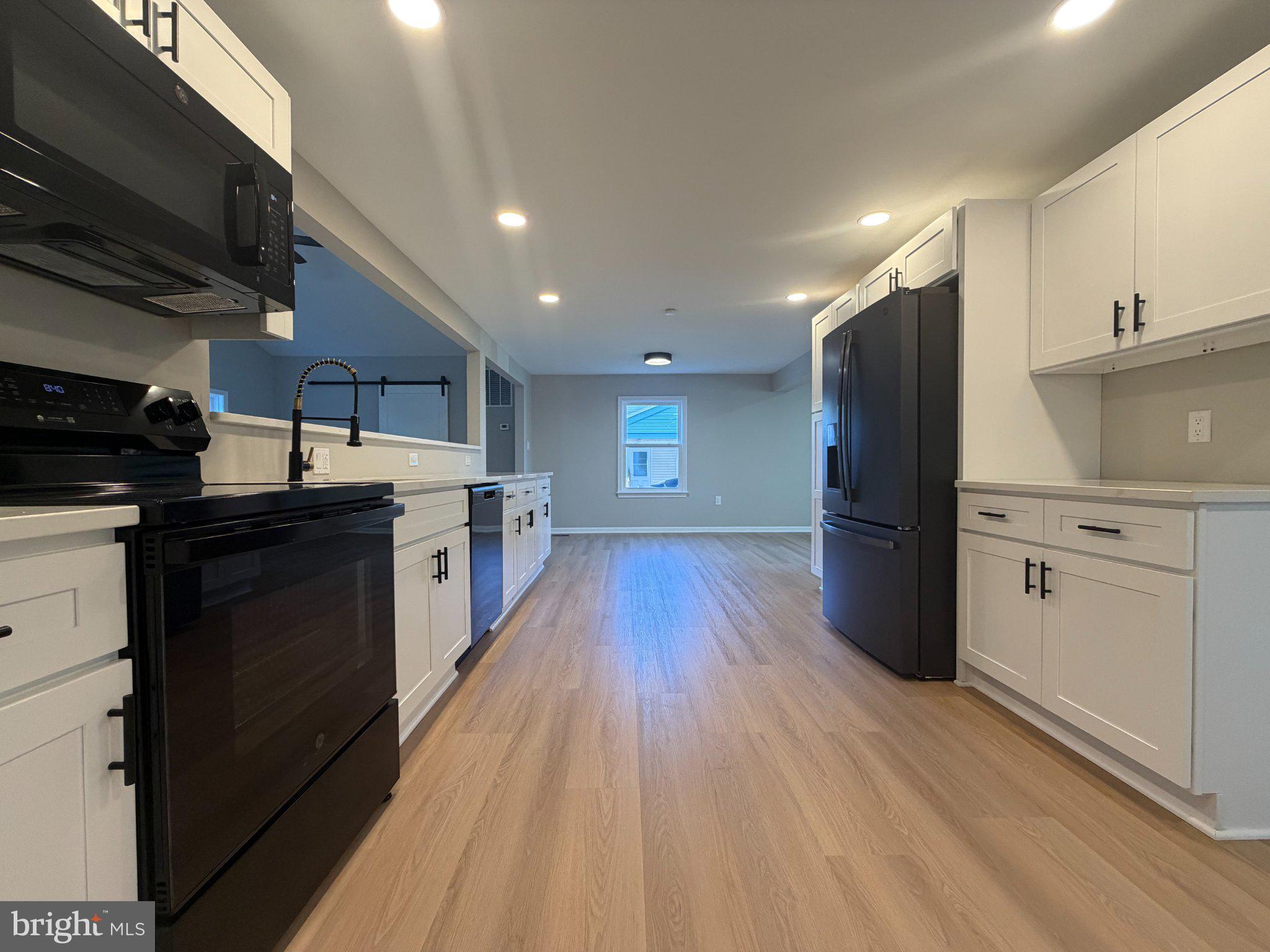 109 Birch Road Stevensville, MD 21666 - Photo 23 of 61 Modern kitchen with sleek finishes.