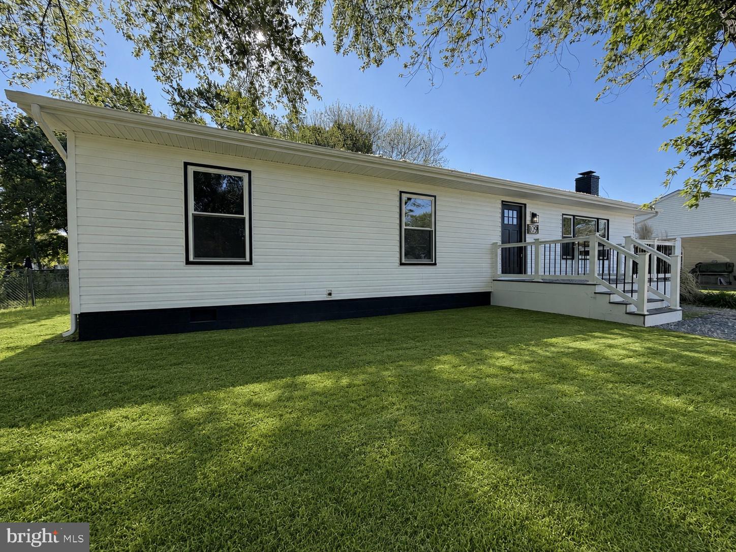 109 Birch Road Stevensville, MD 21666 - Photo 3 of 61 Charming home with lush green lawn.