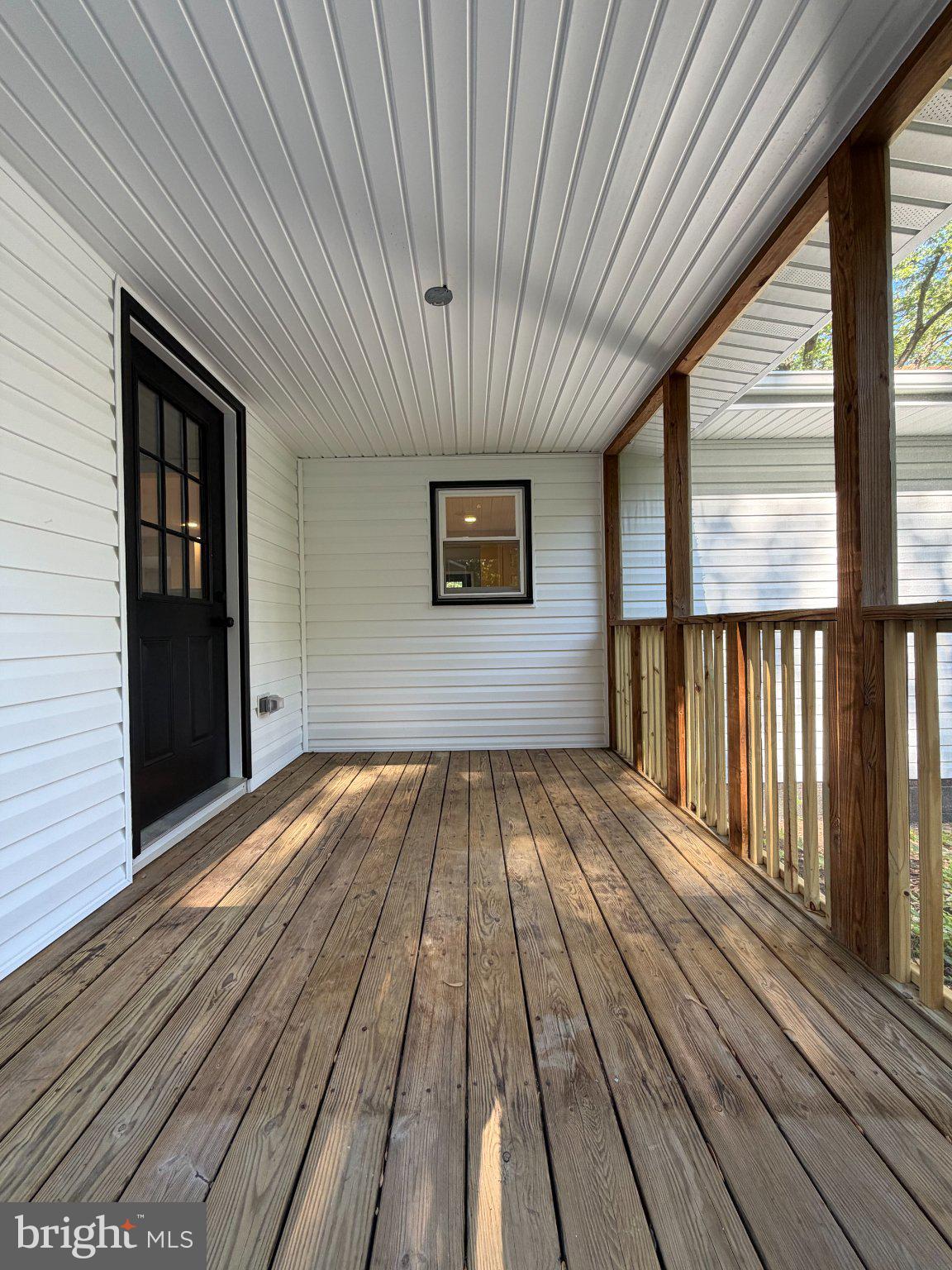 109 Birch Road Stevensville, MD 21666 - Photo 46 of 61 Inviting porch with natural light.