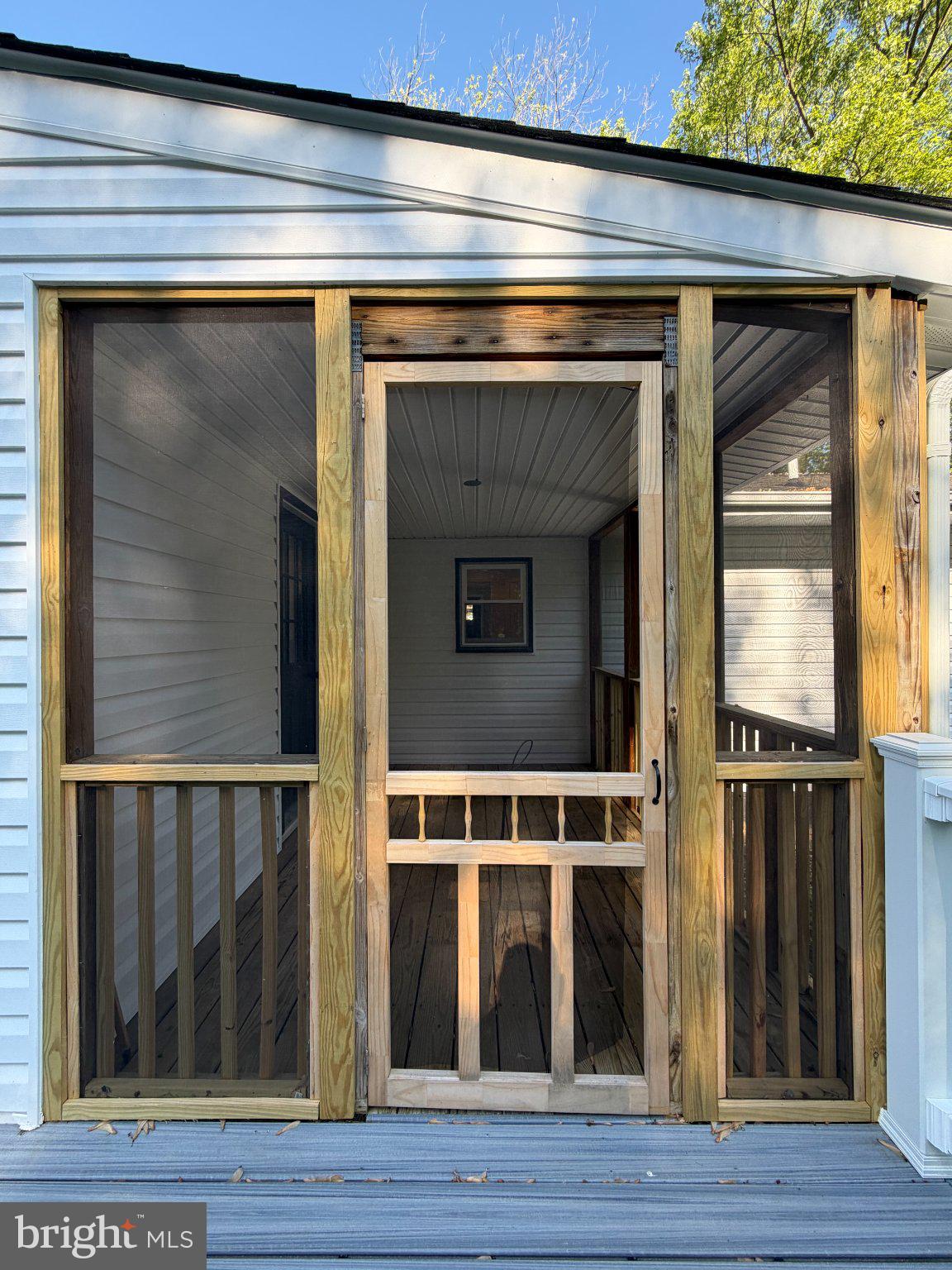 109 Birch Road Stevensville, MD 21666 - Photo 47 of 61 Charming screened porch entrance.