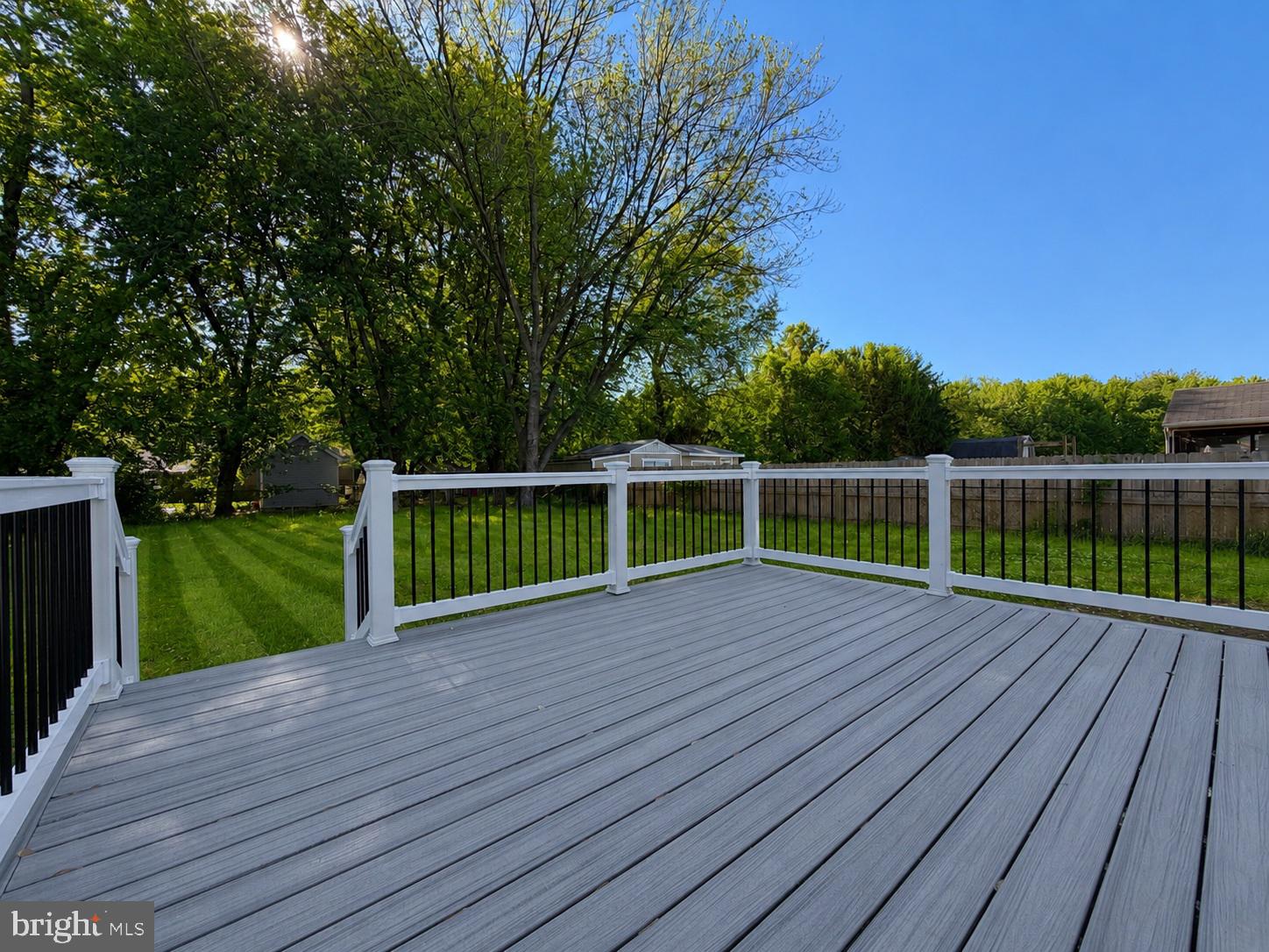 109 Birch Road Stevensville, MD 21666 - Photo 48 of 61 Spacious deck with lush green views.