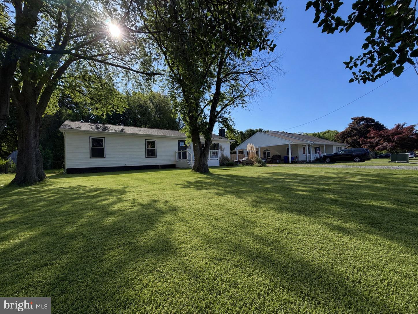 109 Birch Road Stevensville, MD 21666 - Photo 60 of 61 Charming homes on a sunlit lawn.