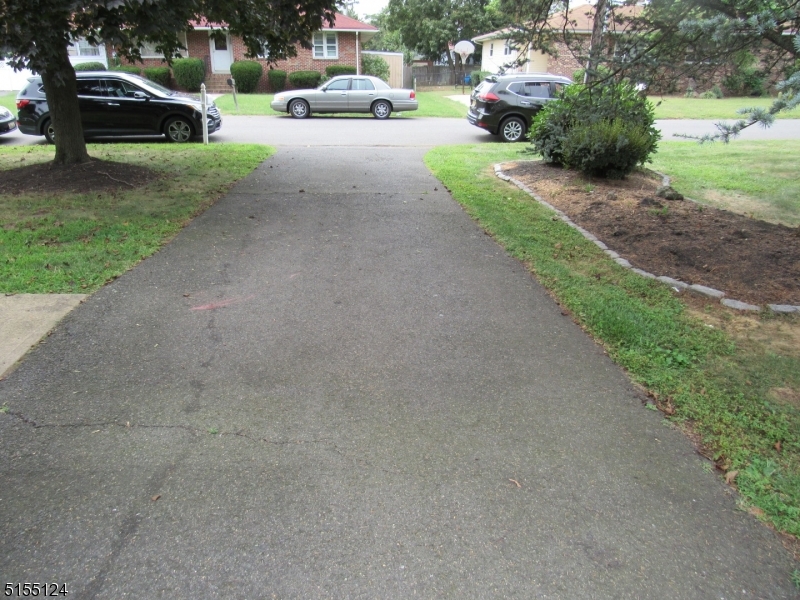 1033 Grove Street North Brunswick, NJ 08902 - Photo 14 of 14 a view of a street with a cars parked cars