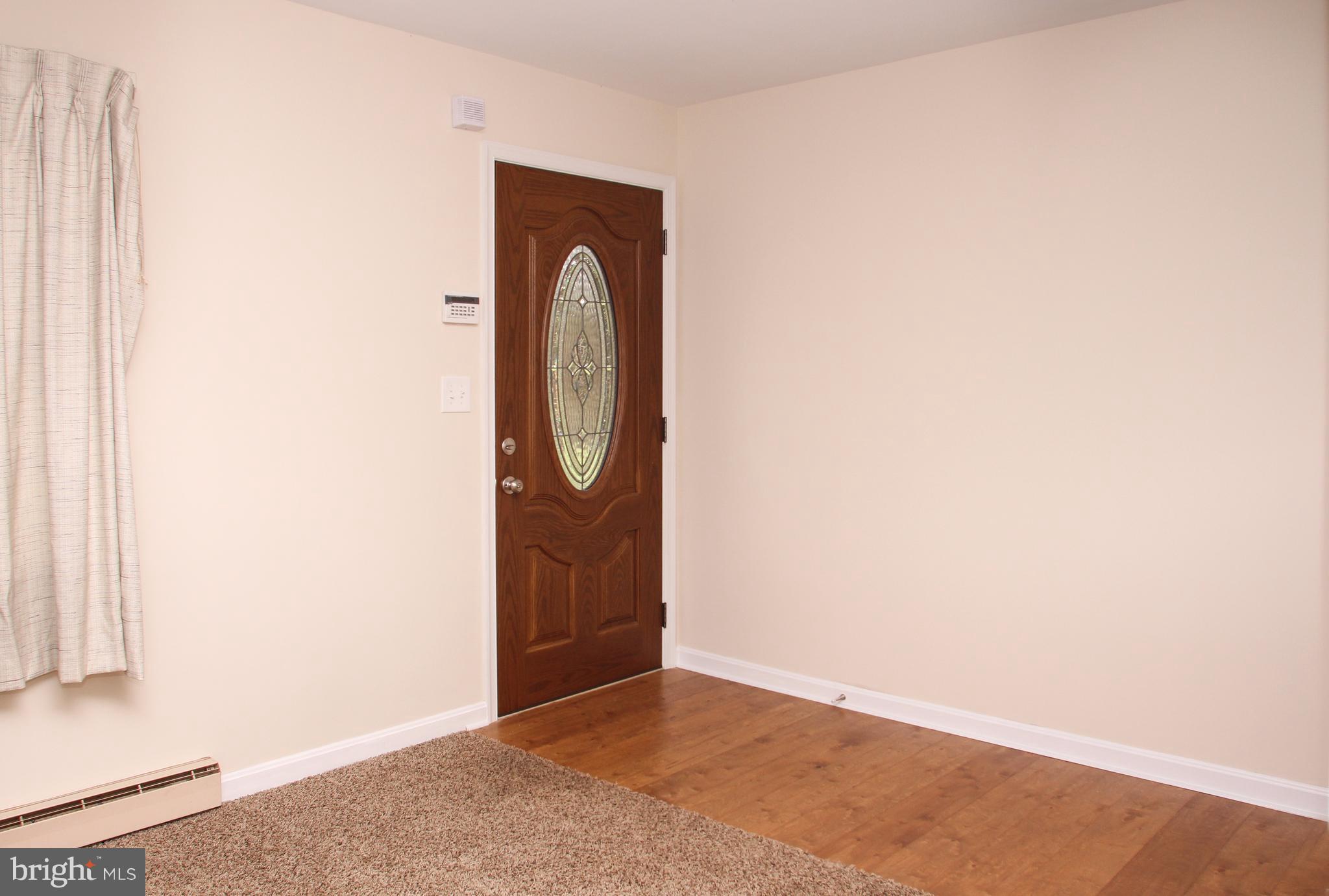 610 Mountain Road Fallston, MD 21047 - Photo 8 of 29 a view of a small space with wooden floor and a window