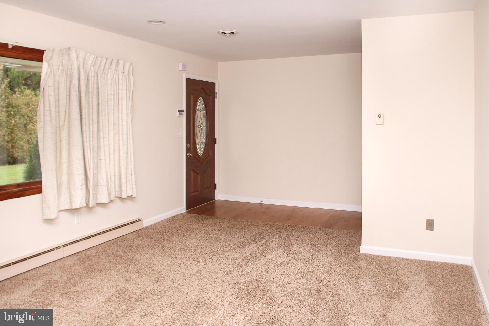 610 Mountain Road Fallston, MD 21047 - Photo 10 of 29 a view of an empty room with a window