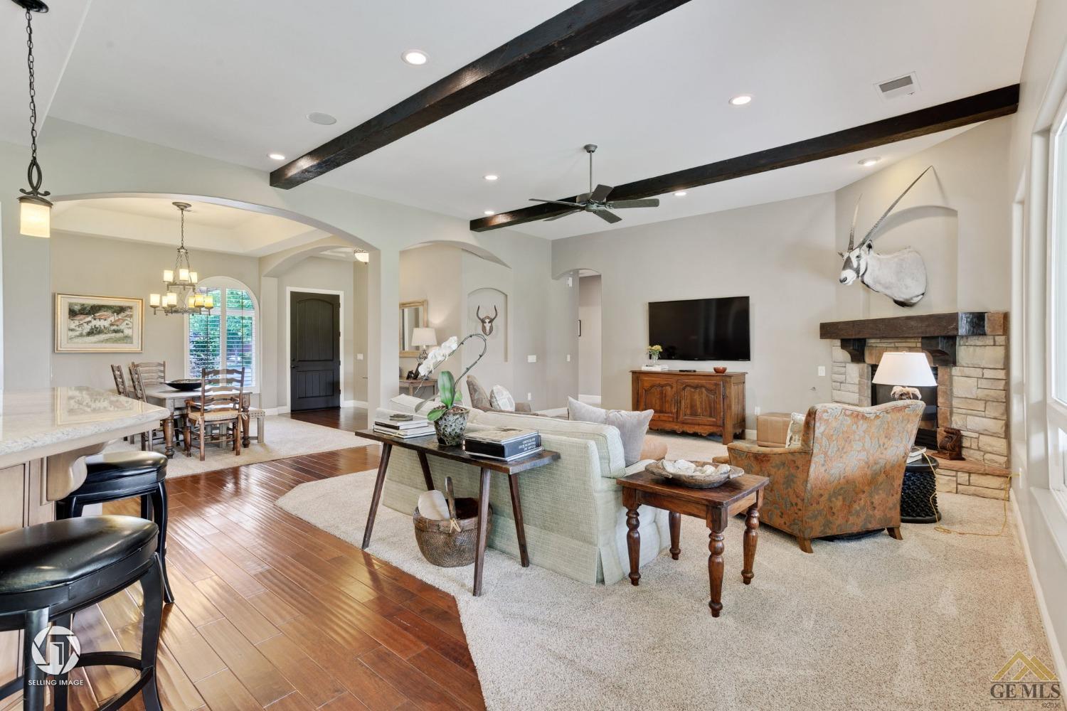 Undisclosed Address Bakersfield, CA 93311 - Photo 16 of 58 a living room with furniture and a flat screen tv