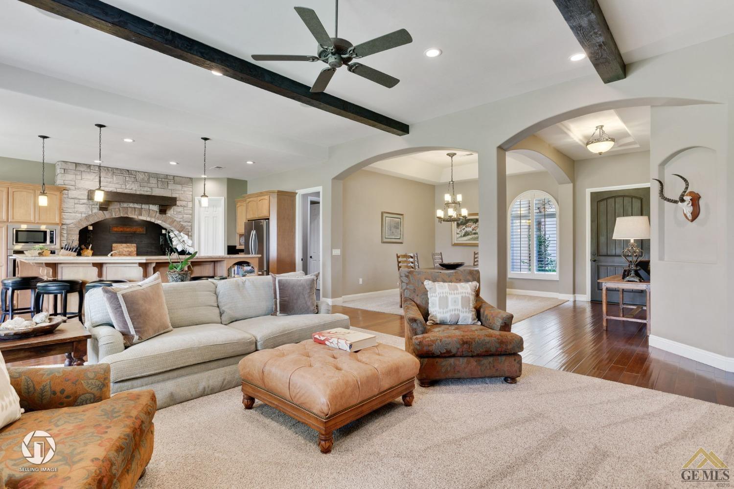 Undisclosed Address Bakersfield, CA 93311 - Photo 17 of 58 a living room with furniture and a view of kitchen