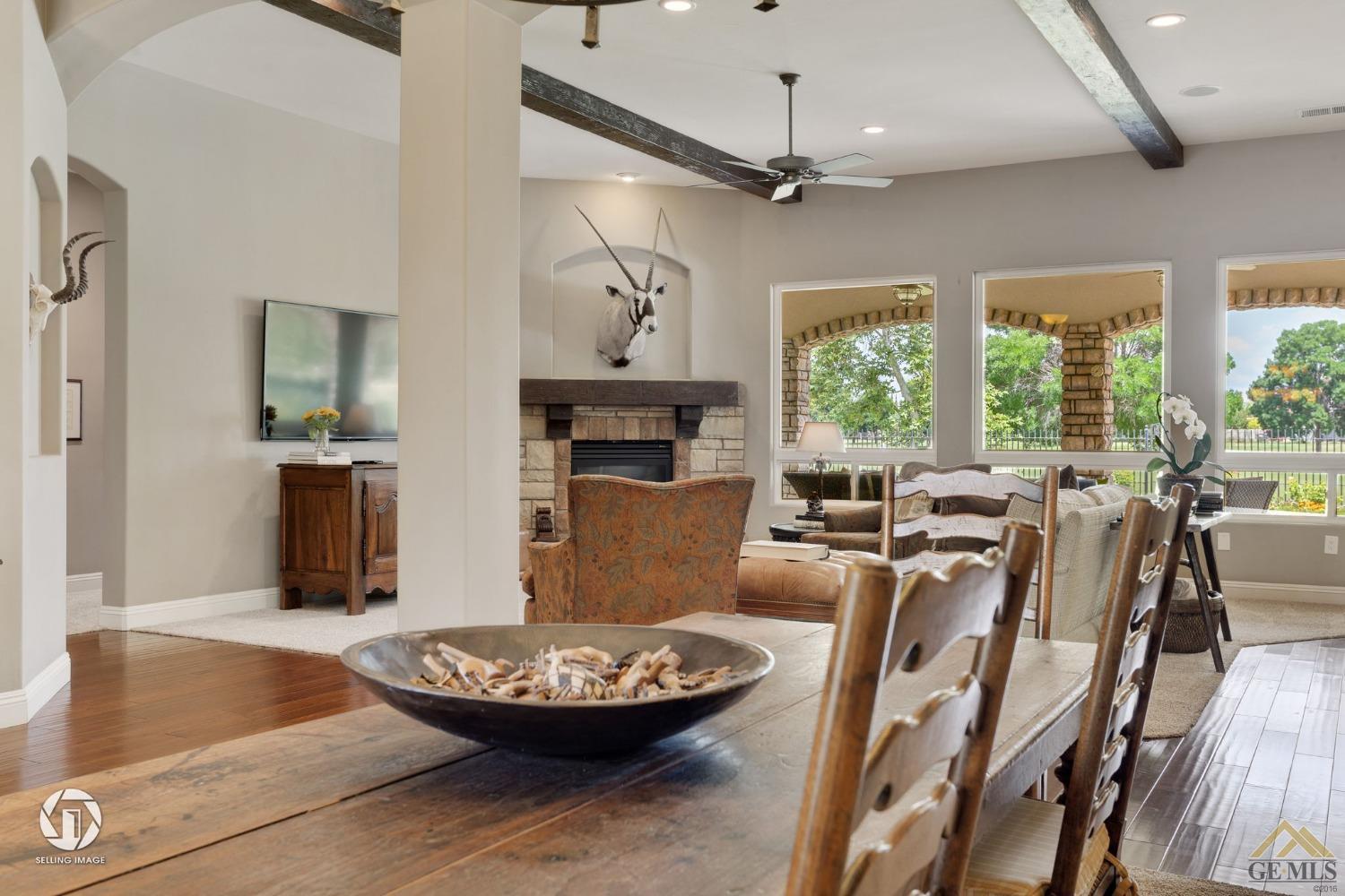 Undisclosed Address Bakersfield, CA 93311 - Photo 29 of 58 a living room with furniture and a fireplace