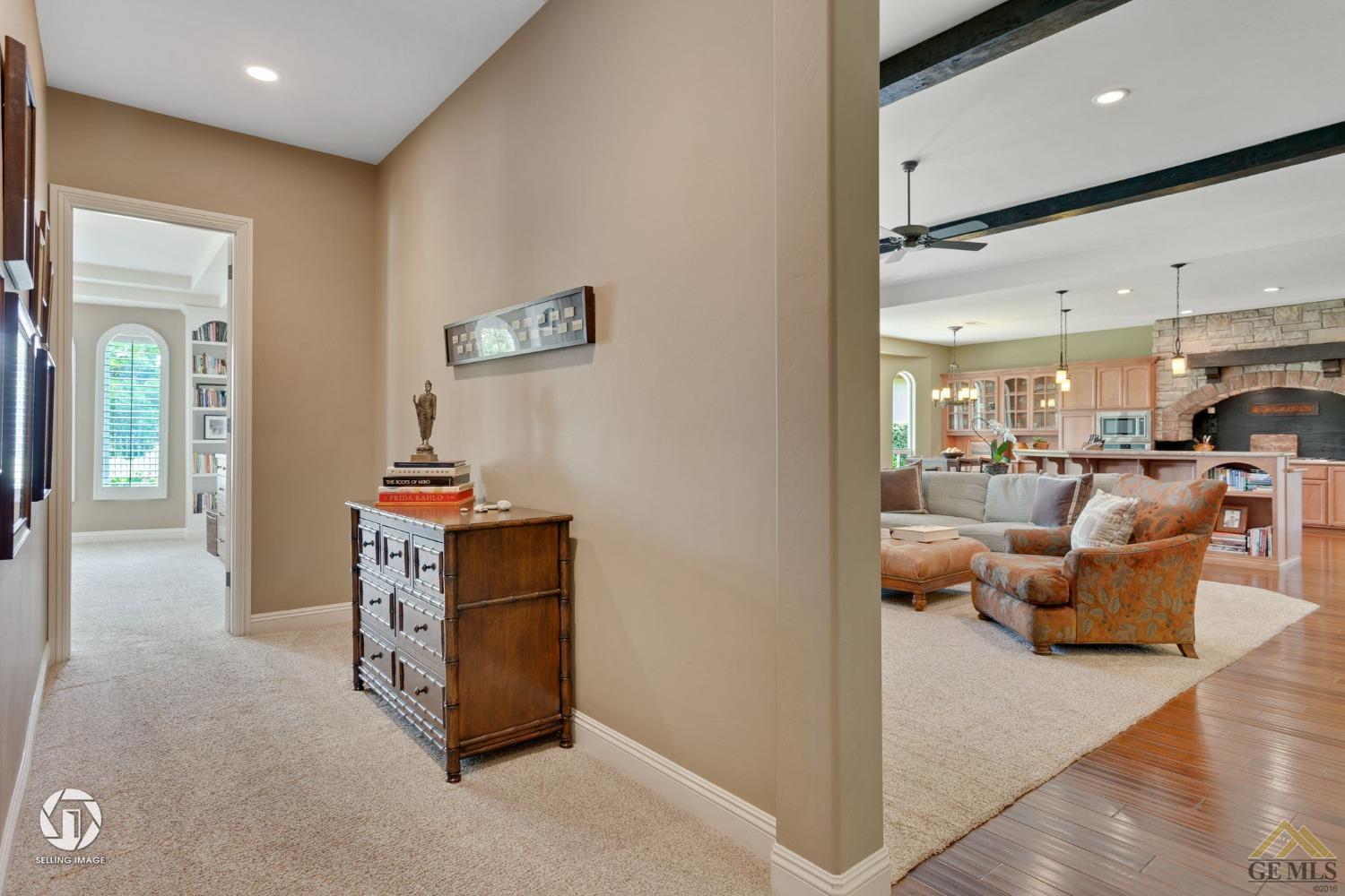 Undisclosed Address Bakersfield, CA 93311 - Photo 33 of 58 a view of living room and kitchen with furniture