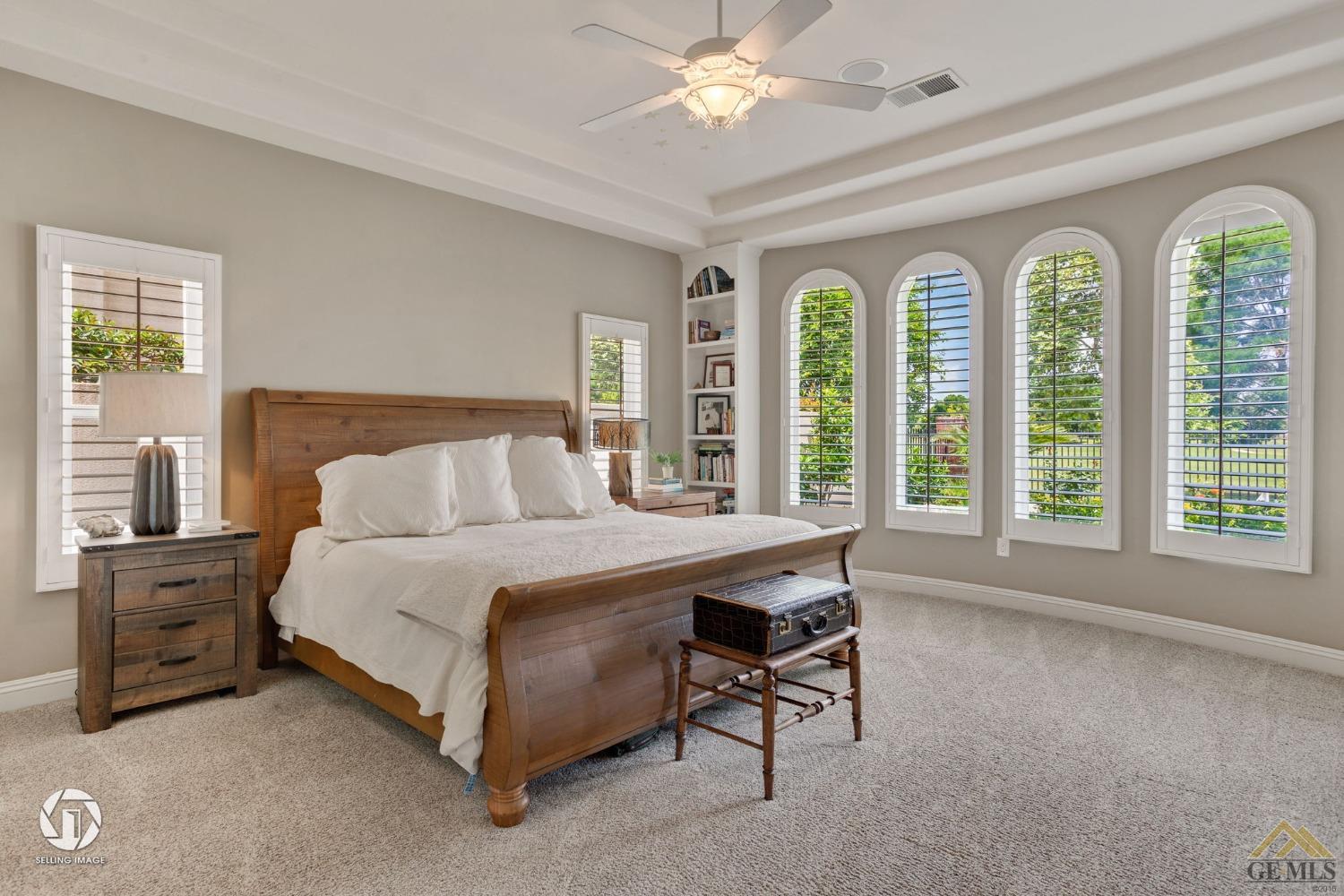 Undisclosed Address Bakersfield, CA 93311 - Photo 34 of 58 a spacious bedroom with a bed and a large window