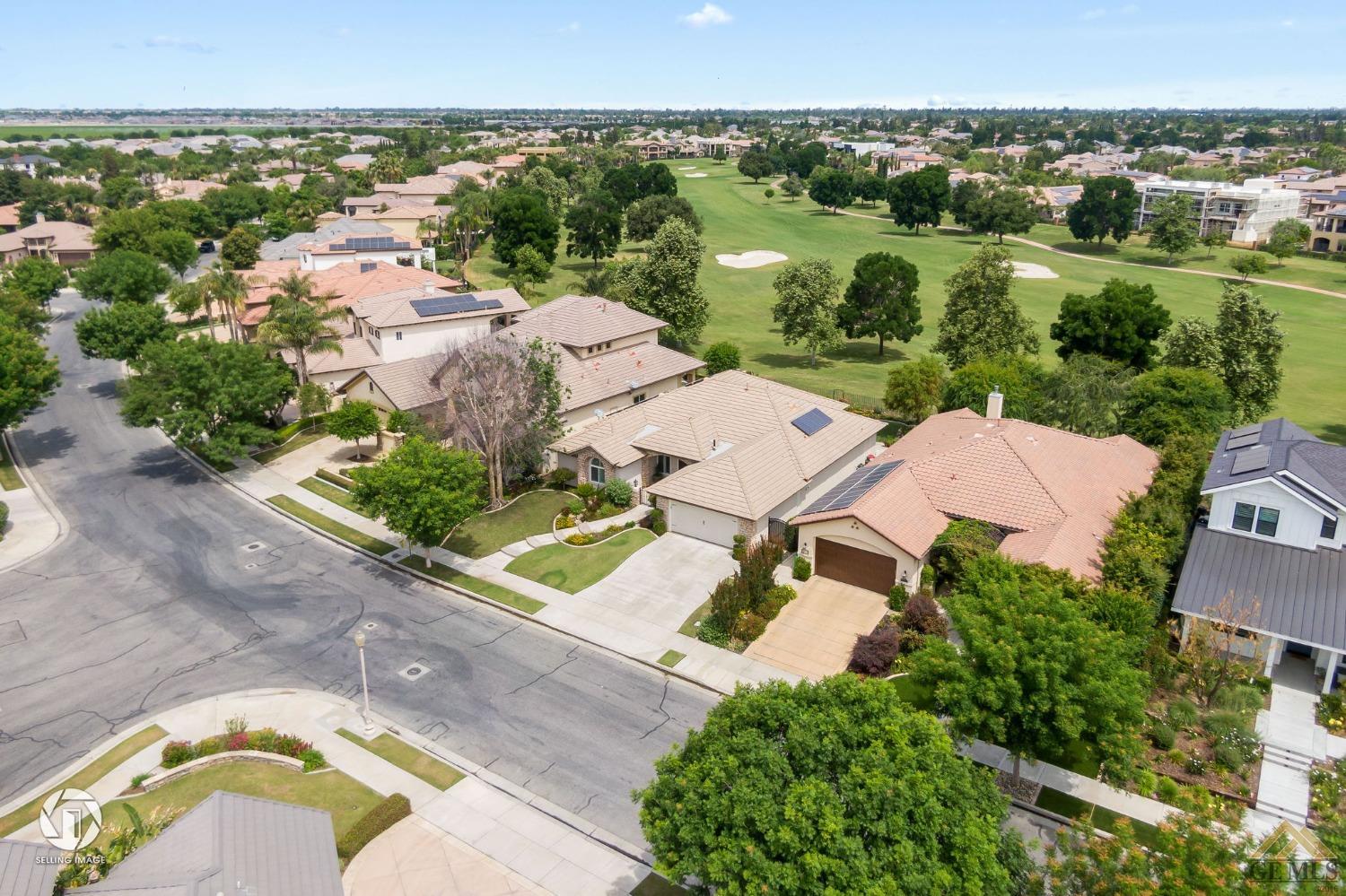Undisclosed Address Bakersfield, CA 93311 - Photo 4 of 58 an aerial view of a house with a garden