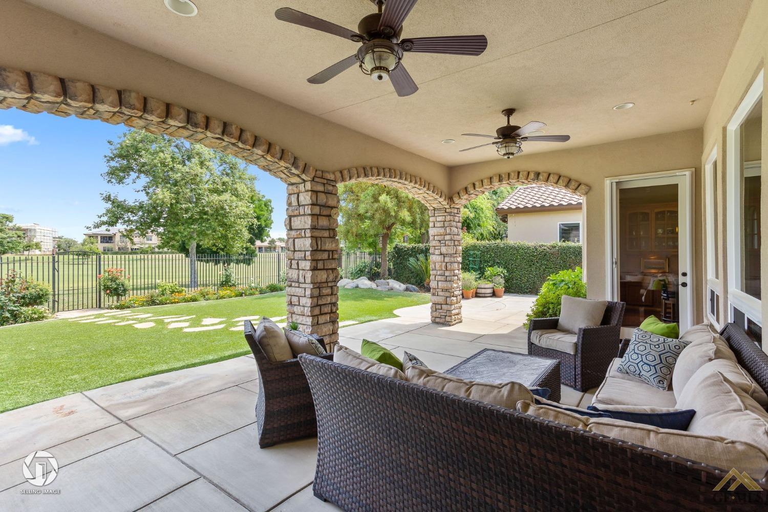 Undisclosed Address Bakersfield, CA 93311 - Photo 46 of 58 a living room with patio furniture and garden