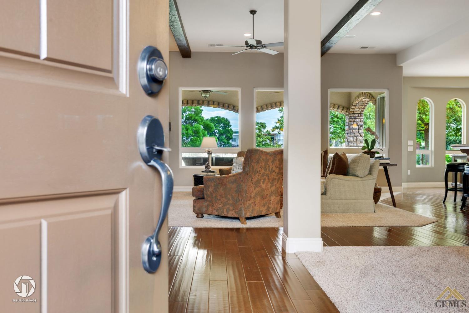 Undisclosed Address Bakersfield, CA 93311 - Photo 10 of 58 a view of living room with furniture and a large window