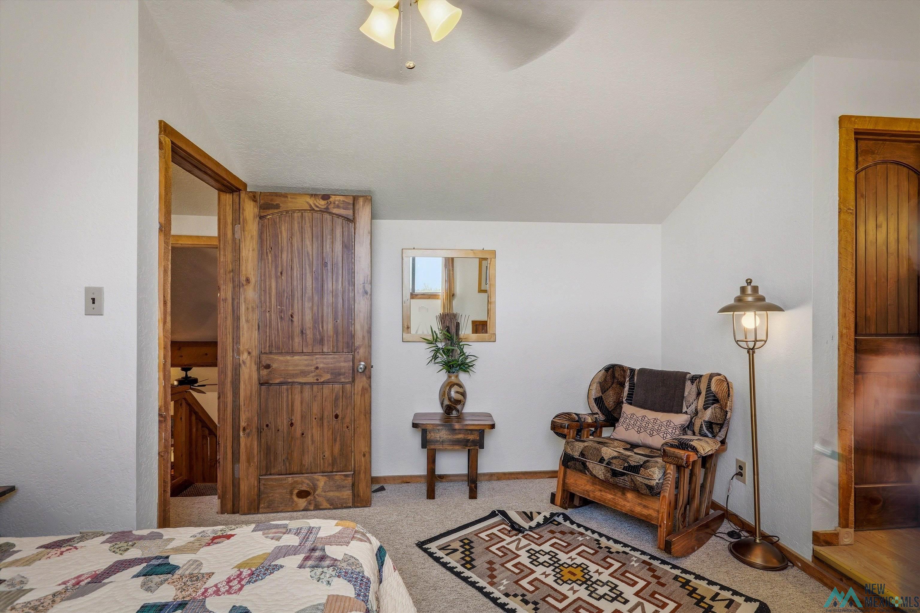 83 Juniper Road Chama, NM 87520 - Photo 35 of 56 Interior space featuring light-toned walls and carpeted flooring