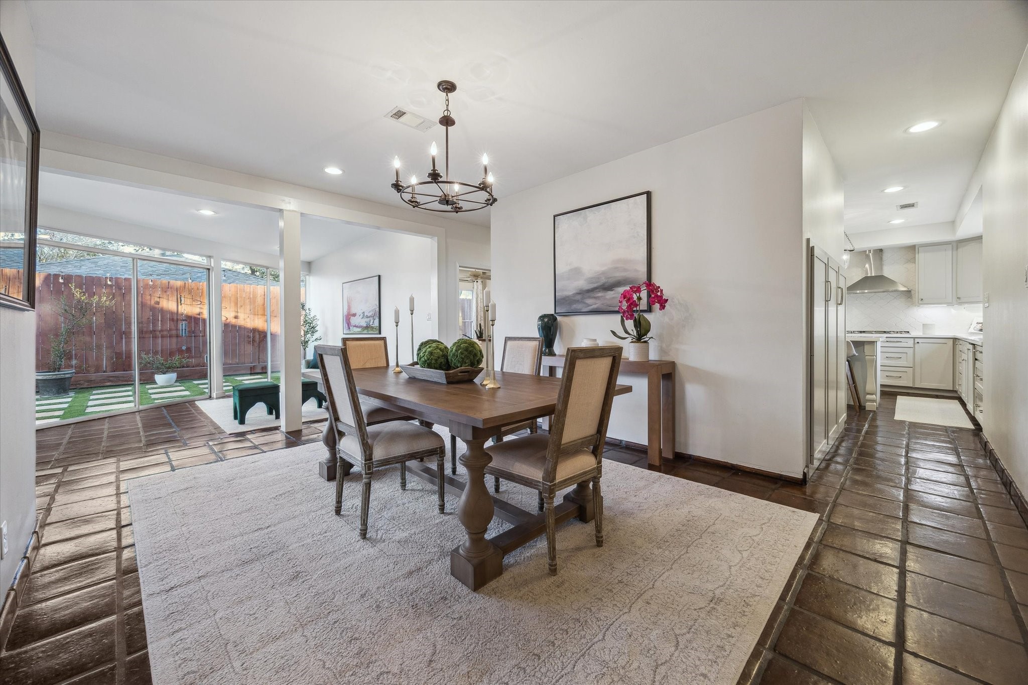 10818 Pepper Lane Houston, TX 77079 - Photo 11 of 34 The dining room opens to the entryway and sunroom