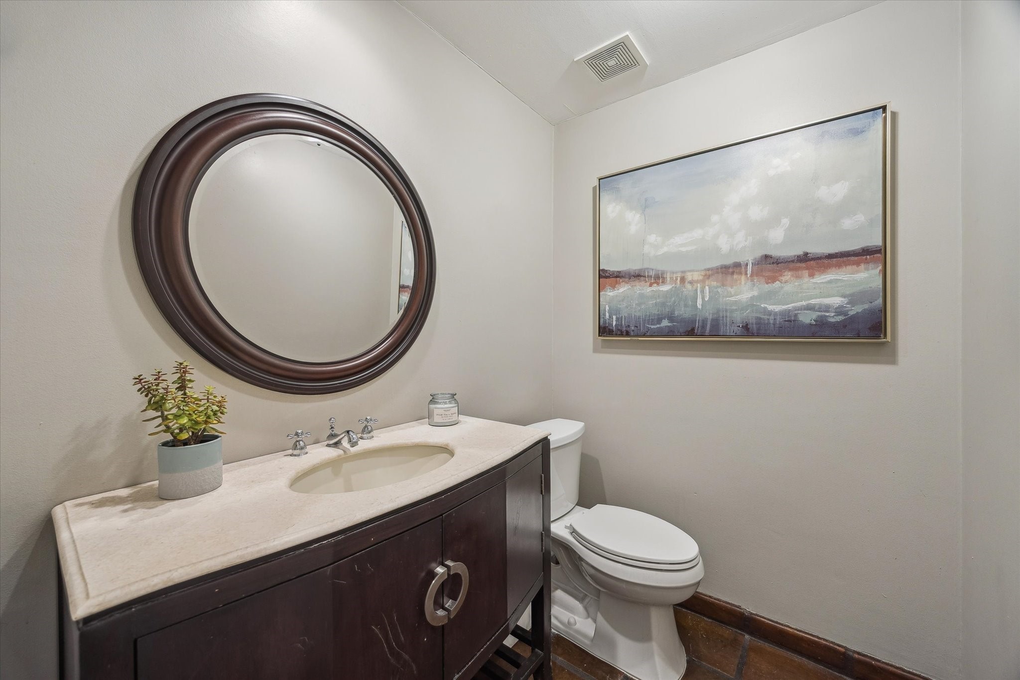 10818 Pepper Lane Houston, TX 77079 - Photo 20 of 34 A half bathroom is conveniently located on the first floor