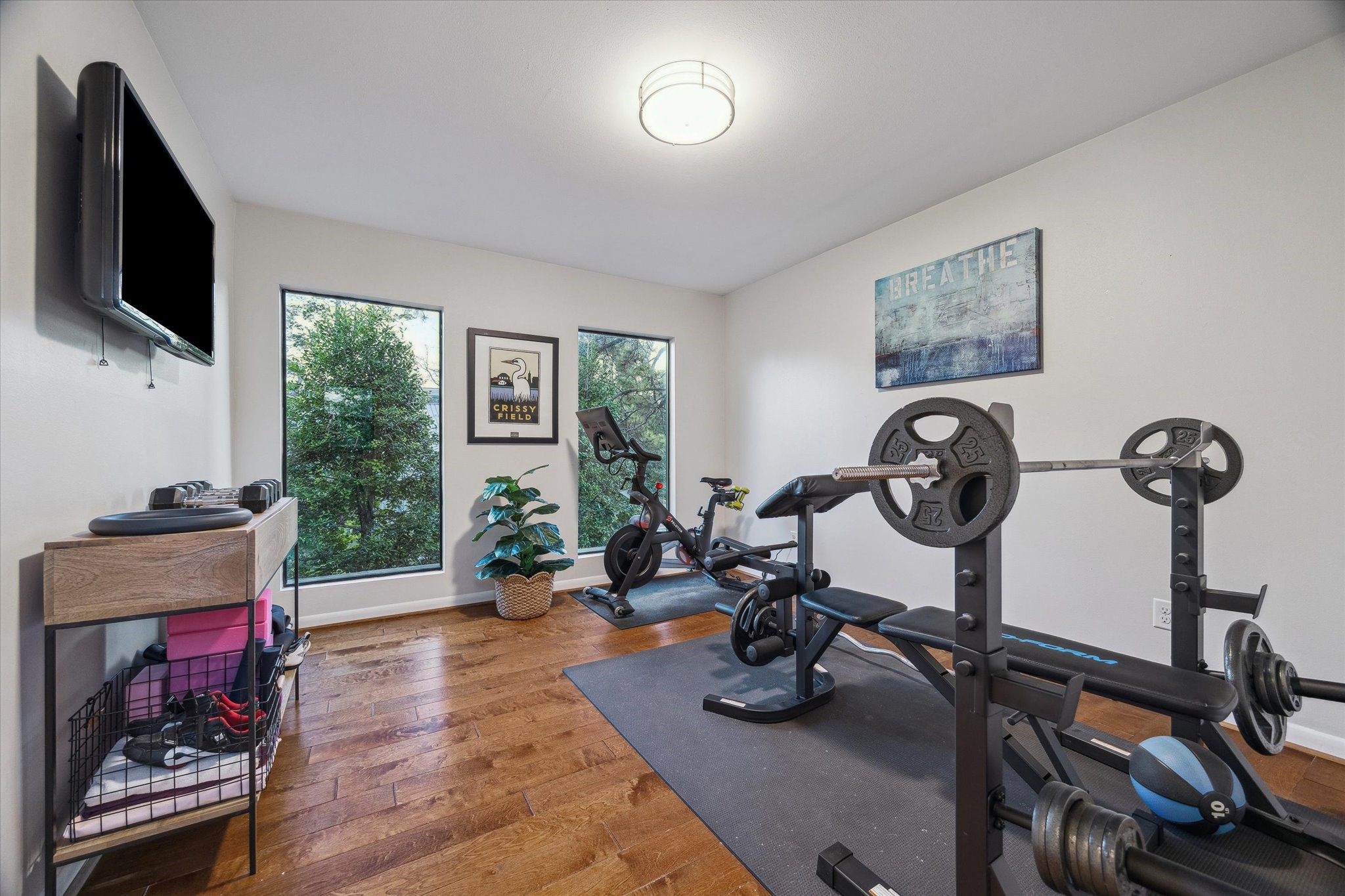 10818 Pepper Lane Houston, TX 77079 - Photo 31 of 34 The upstairs flex room is set up as a wellness room.