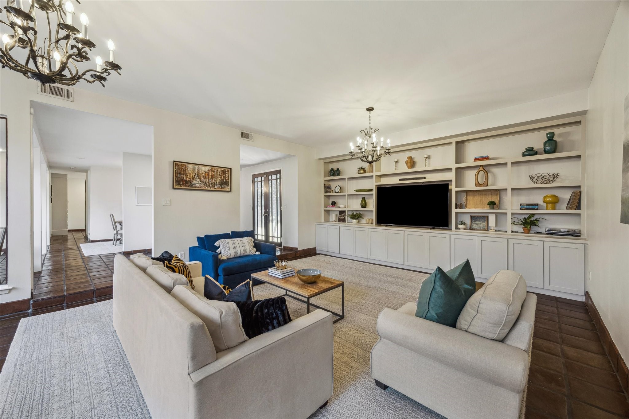 10818 Pepper Lane Houston, TX 77079 - Photo 6 of 34 Another view of the living room showcasing custom built-ins