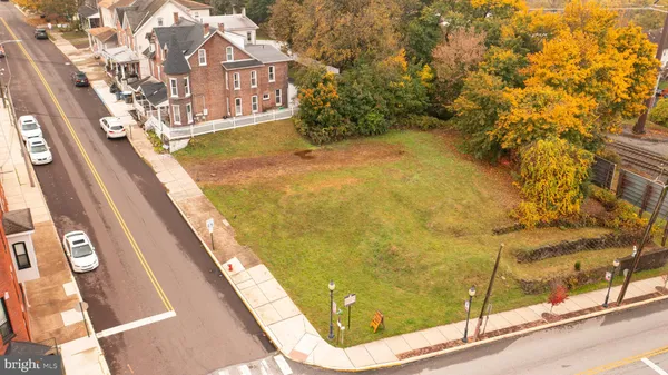 a view of swimming pool with a yard