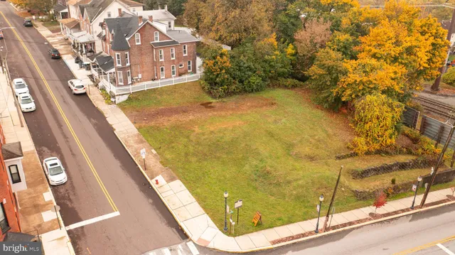 a view of swimming pool with a yard