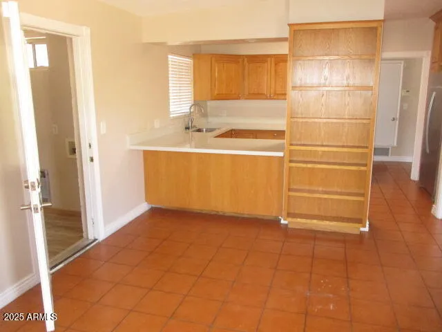 a bathroom with a sink and a shower