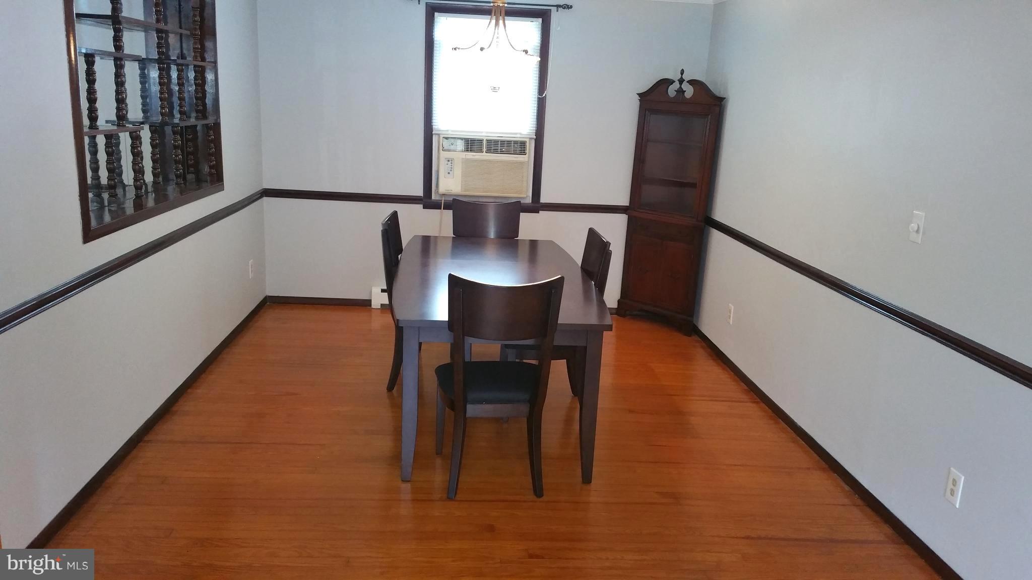 8227 Parkway Road Curtis Bay, MD 21226 - Photo 6 of 26 Large Dining Room with Beautiful Hardwood Floors!