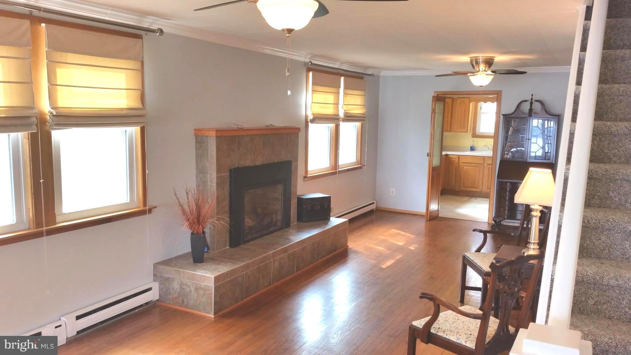 8227 Parkway Road Curtis Bay, MD 21226 - Photo 8 of 26 Living Room w/ Fireplace